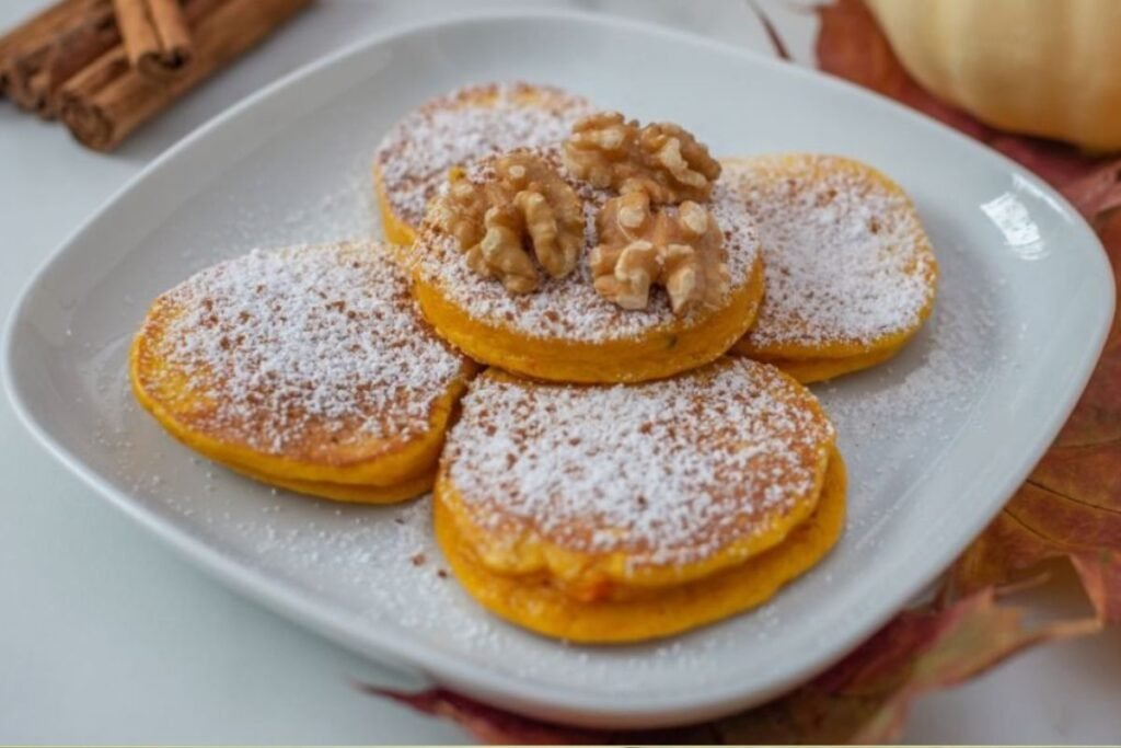 Fluffy Pumpkin Pancakes with Powdered Sugar – a Real Treat!